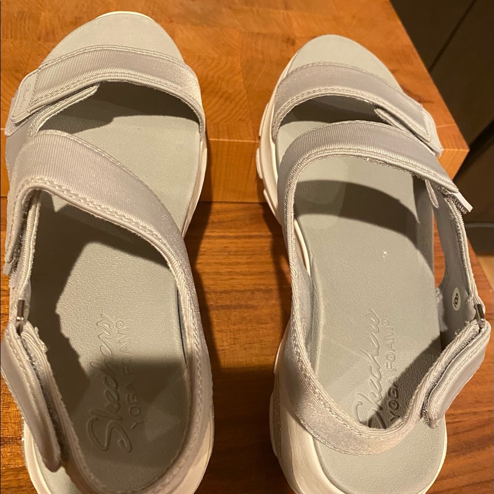 Sketchers gray sandals. Never used. Sitting in my closet.